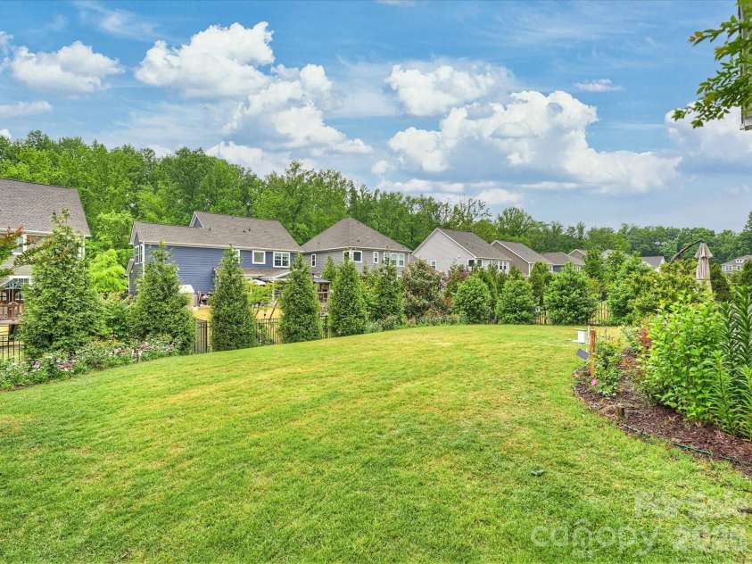 932 Claires Creek Lane, Davidson, NC 28036.  MLS# CAR4370452, YatesRealty ID 18798. Backyard 