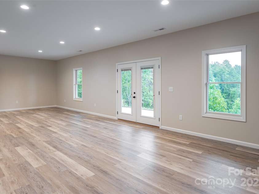 181 Flint Morgan Road, Mars Hill, NC 28754.  MLS# CAR4288459, YatesRealty ID 1880. Family Room