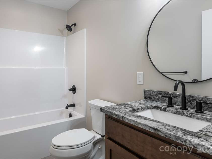 181 Flint Morgan Road, Mars Hill, NC 28754.  MLS# CAR4288459, YatesRealty ID 1880. Guest Bath on Main Level