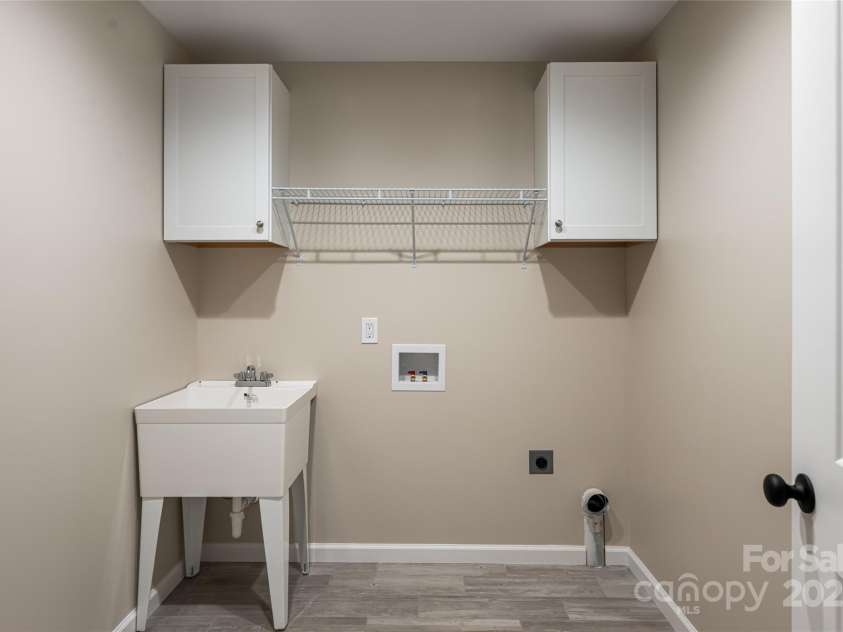 181 Flint Morgan Road, Mars Hill, NC 28754.  MLS# CAR4288459, YatesRealty ID 1880. Laundry Room on Main