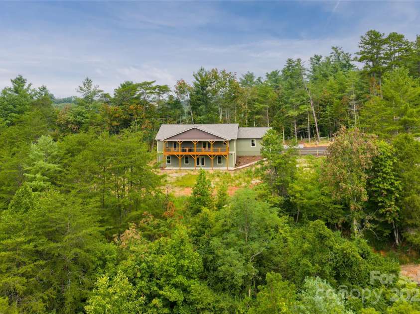 181 Flint Morgan Road, Mars Hill, NC 28754.  MLS# CAR4288459, YatesRealty ID 1880. Private and Serene Setting