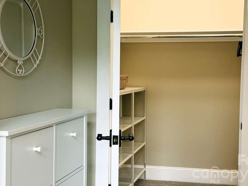 4 Fitzgerald Road, Black Mountain, NC 28711.  MLS# CAR4371041, YatesRealty ID 18801. Primary Bedroom closet