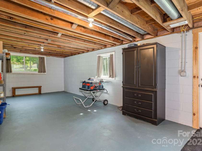 4329 Island Ford Road, Brevard, NC 28712.  MLS# CAR4252076, YatesRealty ID 18801. Basement to use as your heart's desire