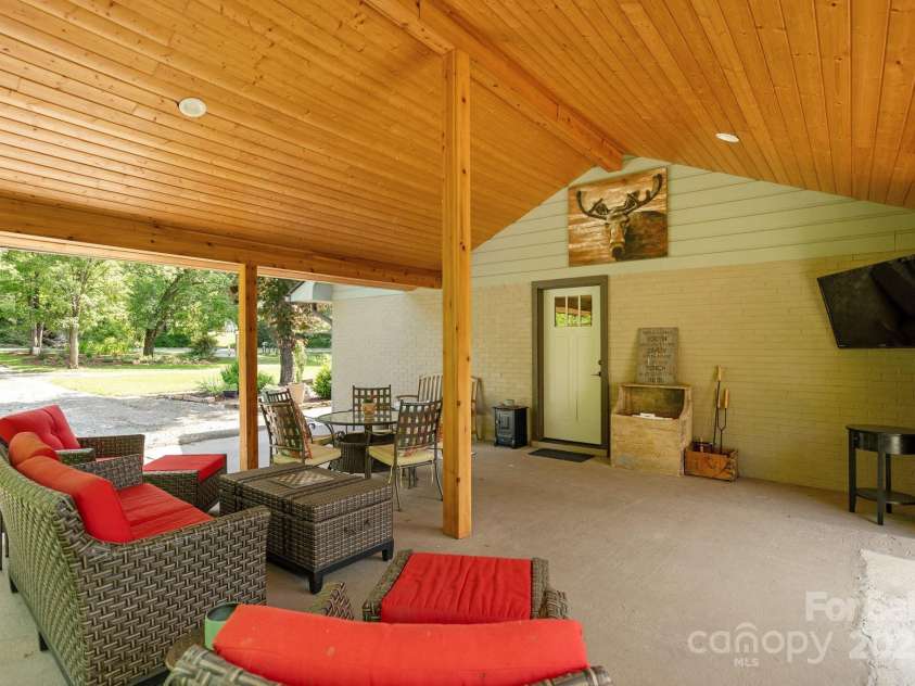 4329 Island Ford Road, Brevard, NC 28712.  MLS# CAR4252076, YatesRealty ID 18801. Beautiful Carport that can be utilized as an outdoor living area