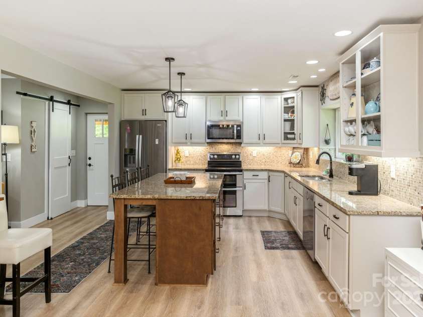 4329 Island Ford Road, Brevard, NC 28712.  MLS# CAR4252076, YatesRealty ID 18801. Luxury Vinyl Plank Flooring throughout the Living Areas