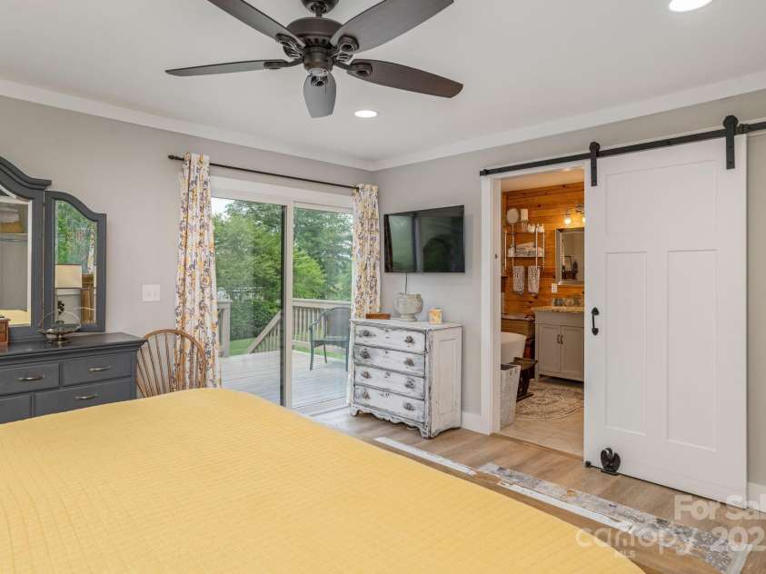 4329 Island Ford Road, Brevard, NC 28712.  MLS# CAR4252076, YatesRealty ID 18801. Primary Bedroom Ensuite Bathroom