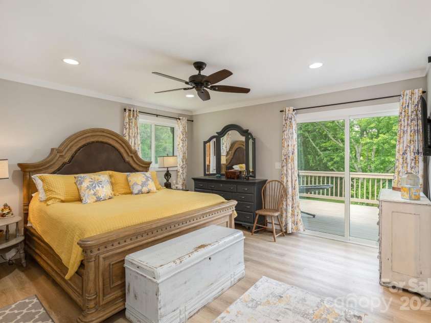 4329 Island Ford Road, Brevard, NC 28712.  MLS# CAR4252076, YatesRealty ID 18801. Primary Bedroom leading to Deck