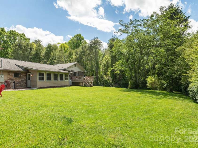 4329 Island Ford Road, Brevard, NC 28712.  MLS# CAR4252076, YatesRealty ID 18801. View of Spacious Backyard