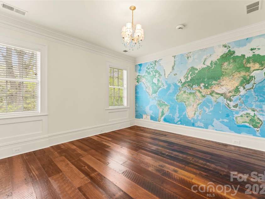 5520 Sharon View Road, Charlotte, NC 28226.  MLS# CAR4360655, YatesRealty ID 18805. Versatile living space highlighted by a custom statement wall, adding character and design interest while maintaining flexibility as a bedroom, office, or creative space