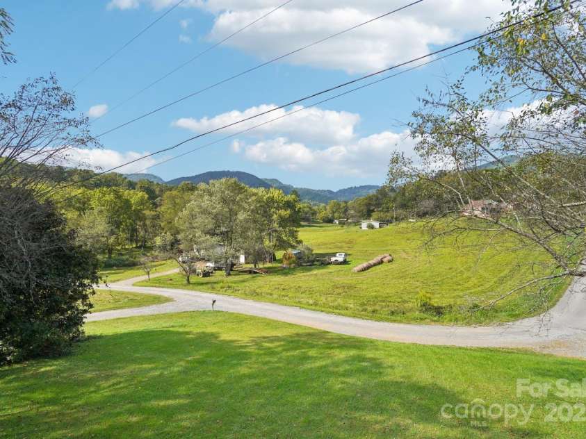 61 Magnolia Drive, Canton, NC 28716.  MLS# CAR4306197, YatesRealty ID 18806. 