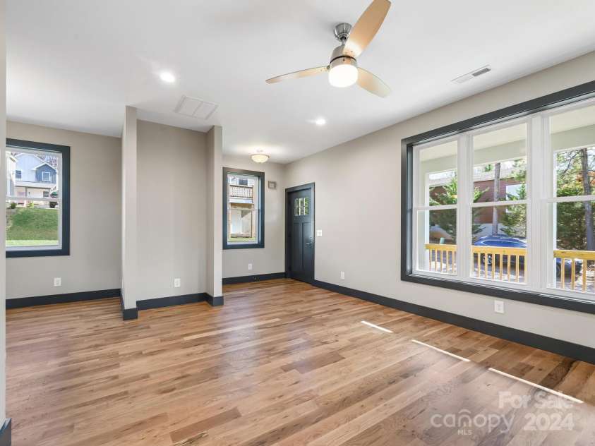 52 Fox Drive, Asheville, NC 28803.  MLS# CAR4201409, YatesRealty ID 1881. Large beautiful windows and 9' ceilings