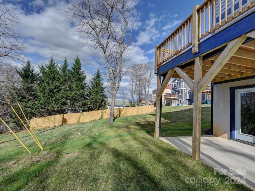 52 Fox Drive, Asheville, NC 28803.  MLS# CAR4201409, YatesRealty ID 1881. Walk out to your large yard