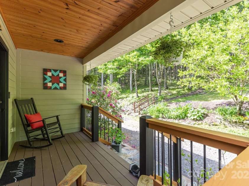 1645 Hickory Springs Road, Burnsville, NC 28714.  MLS# CAR4260205, YatesRealty ID 18810. Back porch, entry off the driveway