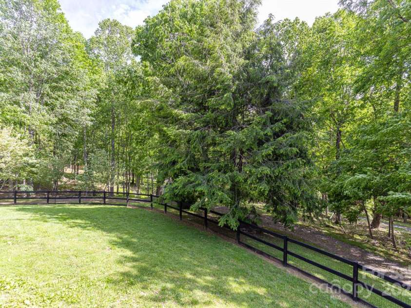 1645 Hickory Springs Road, Burnsville, NC 28714.  MLS# CAR4260205, YatesRealty ID 18810. Fully- fenced in yard for your furry friends