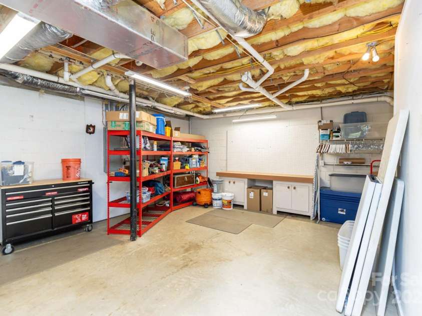 1645 Hickory Springs Road, Burnsville, NC 28714.  MLS# CAR4260205, YatesRealty ID 18810. Large basement