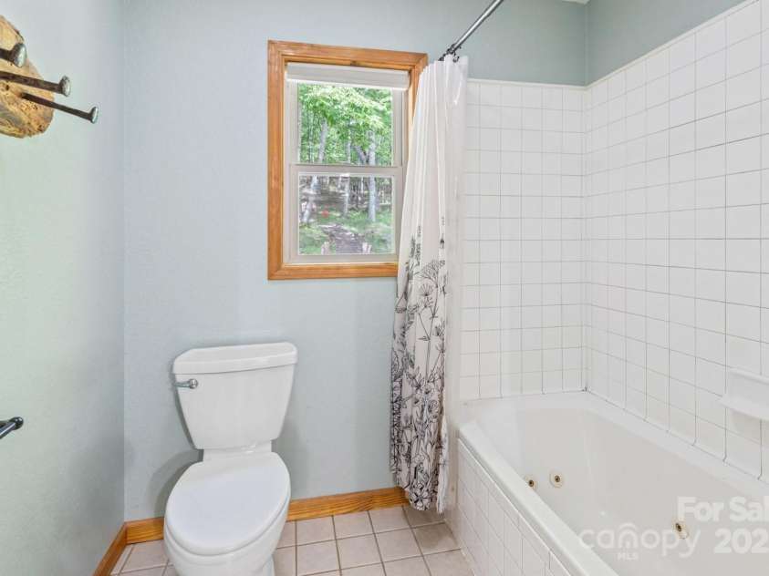 1645 Hickory Springs Road, Burnsville, NC 28714.  MLS# CAR4260205, YatesRealty ID 18810. Primary bathroom