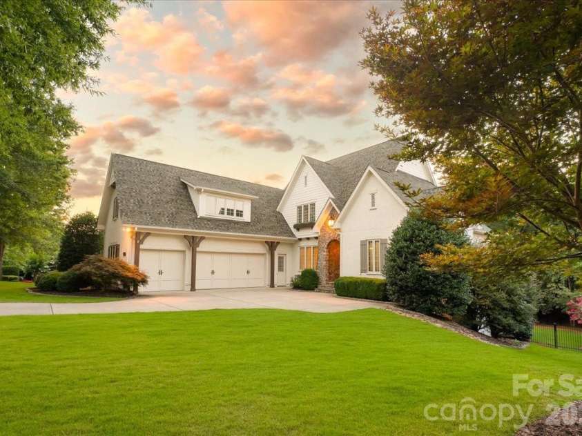 16728 Ashton Oaks Drive, Charlotte, NC 28278.  MLS# CAR4401853, YatesRealty ID 18814. A timeless first impression begins long before you step through the front door.