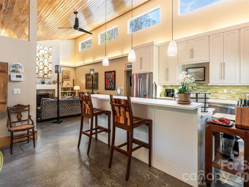 33 Robinson Creek Road, Asheville, NC 28803.  MLS# CAR4359892, YatesRealty ID 18816. 16' high in the air triple pane/UV clerestory windows