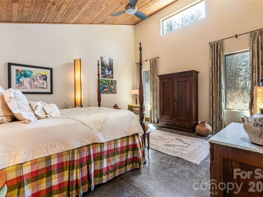 33 Robinson Creek Road, Asheville, NC 28803.  MLS# CAR4359892, YatesRealty ID 18816. Passive solar design maximizing natural light