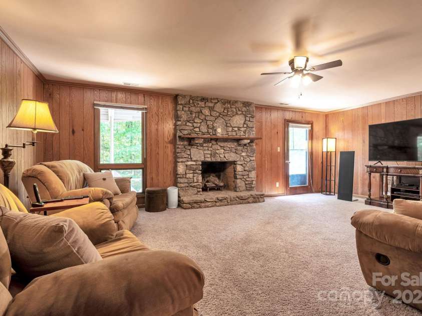97 Ballantree Drive, Asheville, NC 28803.  MLS# CAR4231911, YatesRealty ID 18818. 2nd Living room Downstairs