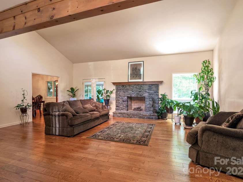 97 Ballantree Drive, Asheville, NC 28803.  MLS# CAR4231911, YatesRealty ID 18818. A warm and welcoming living space designed for relaxing evenings and easy entertaining