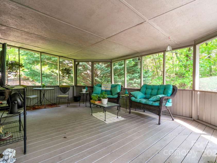 97 Ballantree Drive, Asheville, NC 28803.  MLS# CAR4231911, YatesRealty ID 18818. Enjoy the screened in porch