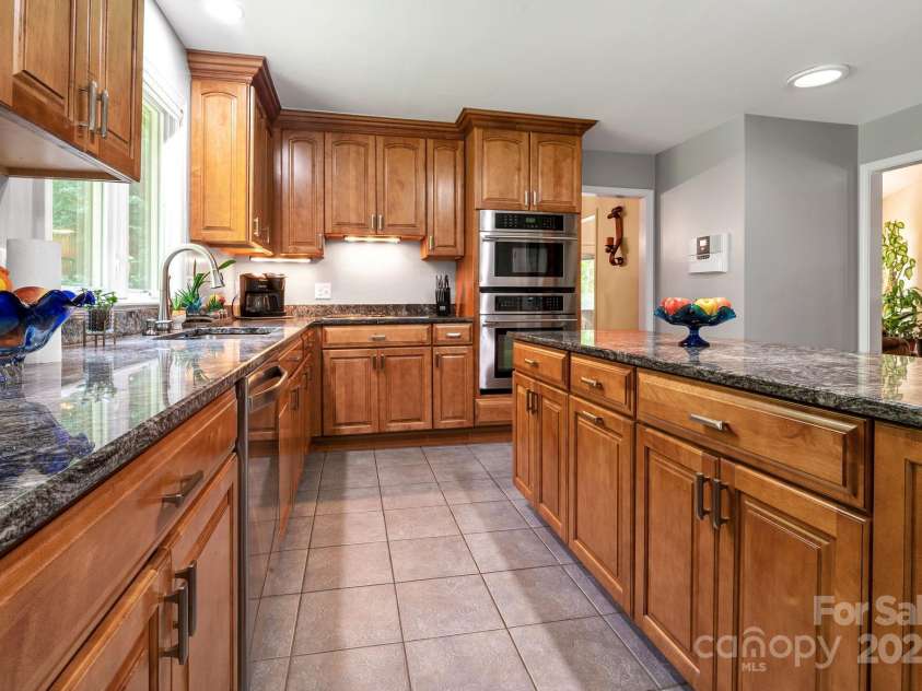 97 Ballantree Drive, Asheville, NC 28803.  MLS# CAR4231911, YatesRealty ID 18818. Perfect for cooking, entertaining, and gathering with family.