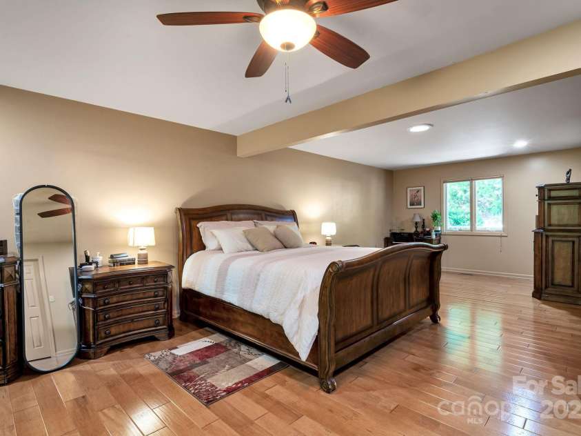 97 Ballantree Drive, Asheville, NC 28803.  MLS# CAR4231911, YatesRealty ID 18818. Wake up to peace and privacy — your retreat on the main level