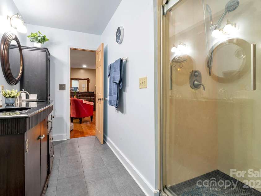 97 Ballantree Drive, Asheville, NC 28803.  MLS# CAR4231911, YatesRealty ID 18818. Walk In Shower
