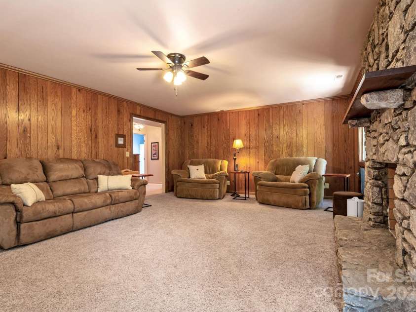 97 Ballantree Drive, Asheville, NC 28803.  MLS# CAR4231911, YatesRealty ID 18818. Your second living area — perfect for extended family or entertaining guests.