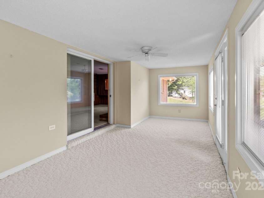 885 Roy Cline Road, Rockwell, NC 28138.  MLS# CAR4268618, YatesRealty ID 18819. Bright sunroom