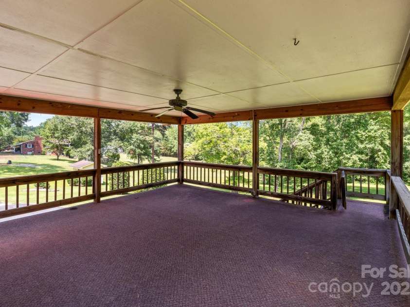 885 Roy Cline Road, Rockwell, NC 28138.  MLS# CAR4268618, YatesRealty ID 18819. Covered deck with fans