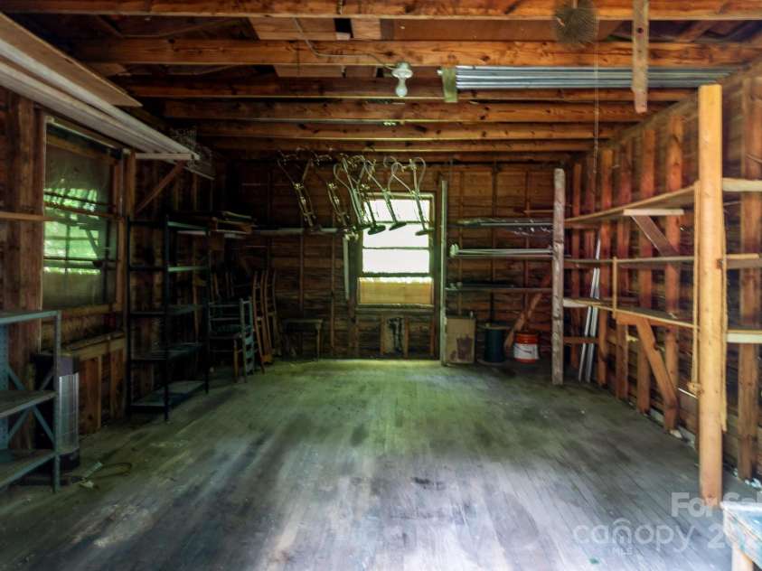 885 Roy Cline Road, Rockwell, NC 28138.  MLS# CAR4268618, YatesRealty ID 18819. Inside of storage shed