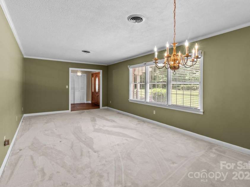 885 Roy Cline Road, Rockwell, NC 28138.  MLS# CAR4268618, YatesRealty ID 18819. Living room/Formal dining area