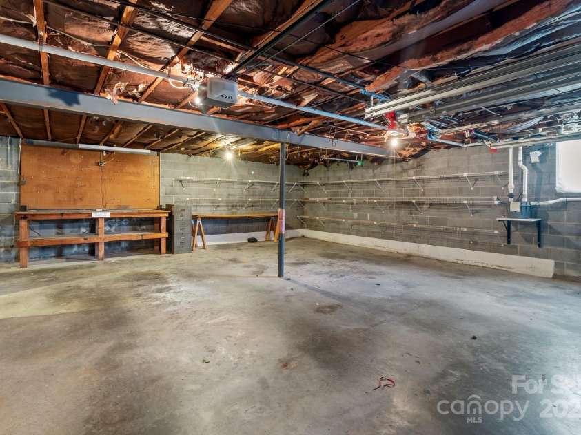 885 Roy Cline Road, Rockwell, NC 28138.  MLS# CAR4268618, YatesRealty ID 18819. Work space garage area
