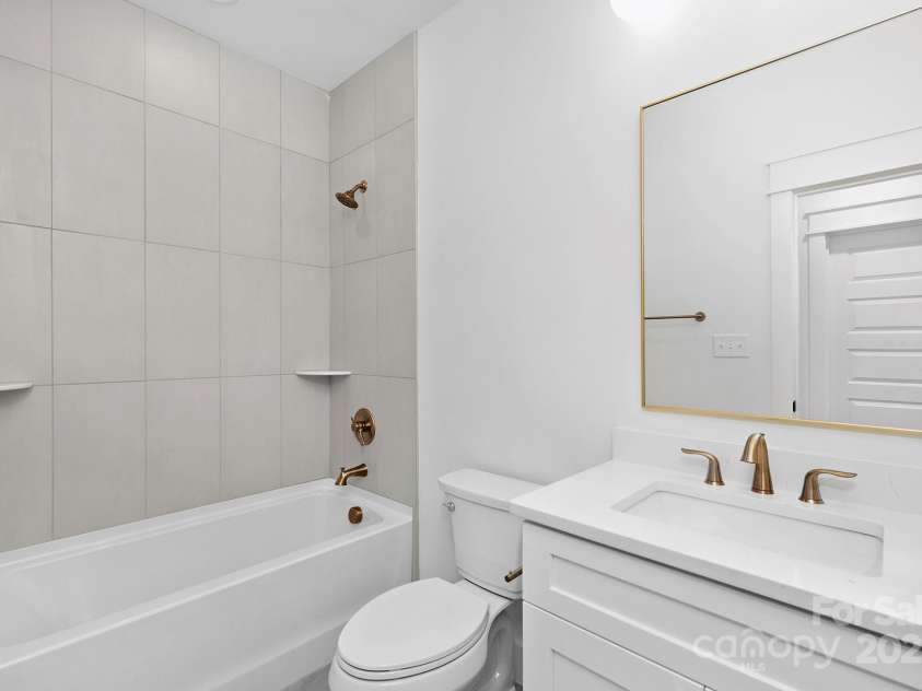 1817 Mint Street, Charlotte, NC 28203.  MLS# CAR4230999, YatesRealty ID 1882. Upstairs second bath