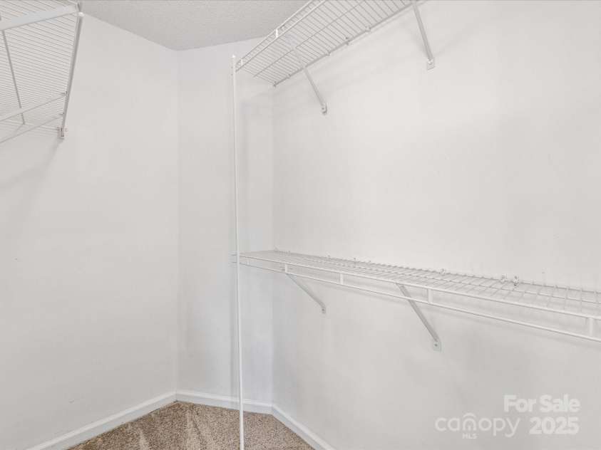 12529 Old Timber Road, Charlotte, NC 28269.  MLS# CAR4265449, YatesRealty ID 18823. Second walk in closet in primary bedroom