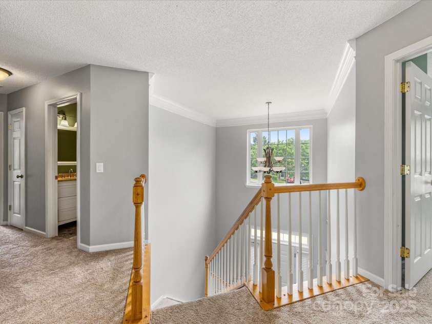 12529 Old Timber Road, Charlotte, NC 28269.  MLS# CAR4265449, YatesRealty ID 18823. Upstairs landing