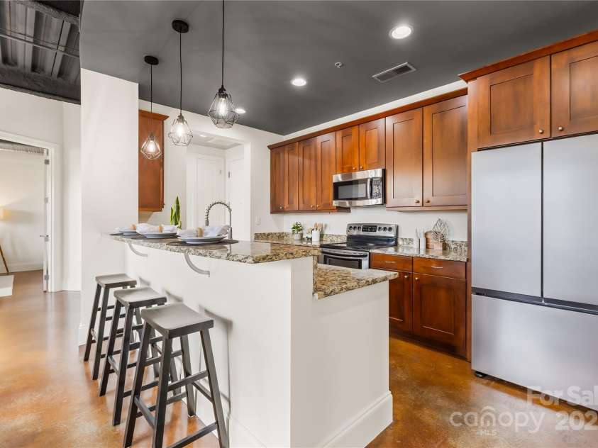 2338 Yadkin Avenue, Charlotte, NC 28205.  MLS# CAR4287671, YatesRealty ID 1883. New Samsung Refrigerator