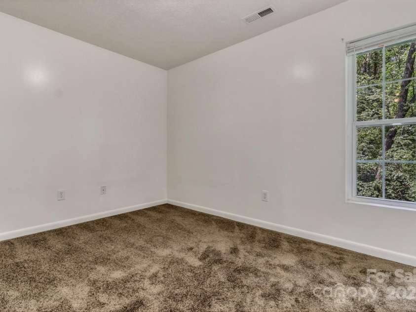 222 New Stock Road, Weaverville, NC 28787.  MLS# CAR4266697, YatesRealty ID 18833. Unit A Bedroom #1