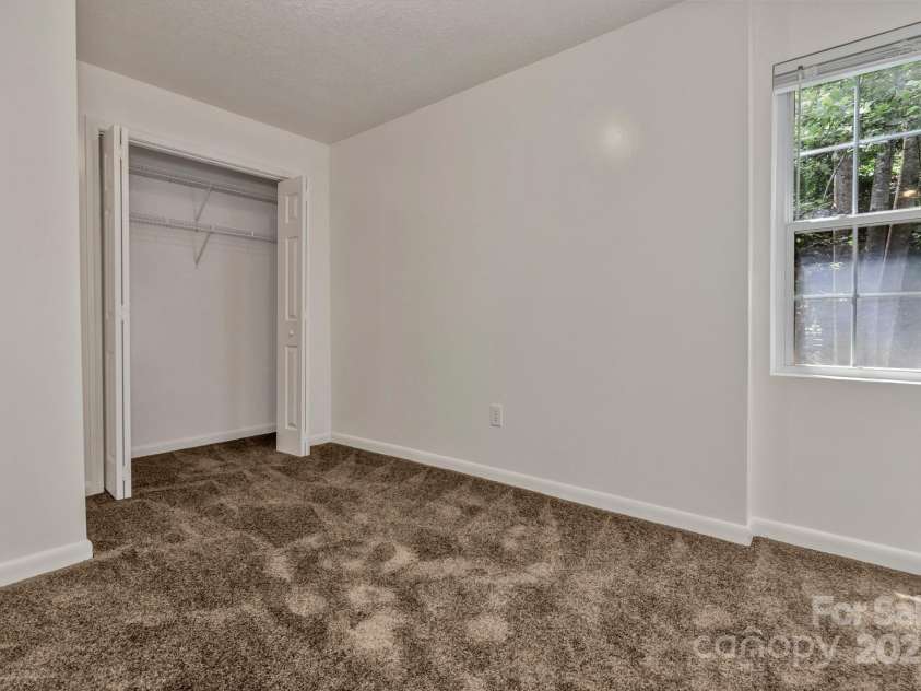 222 New Stock Road, Weaverville, NC 28787.  MLS# CAR4266697, YatesRealty ID 18833. Unit A Bedroom #1