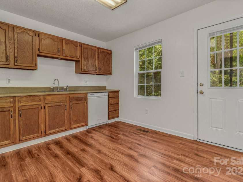 222 New Stock Road, Weaverville, NC 28787.  MLS# CAR4266697, YatesRealty ID 18833. Unit A - Kitchen