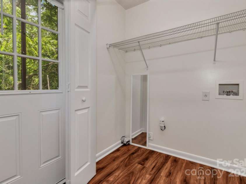 222 New Stock Road, Weaverville, NC 28787.  MLS# CAR4266697, YatesRealty ID 18833. Unit A - laundry room off kitchen