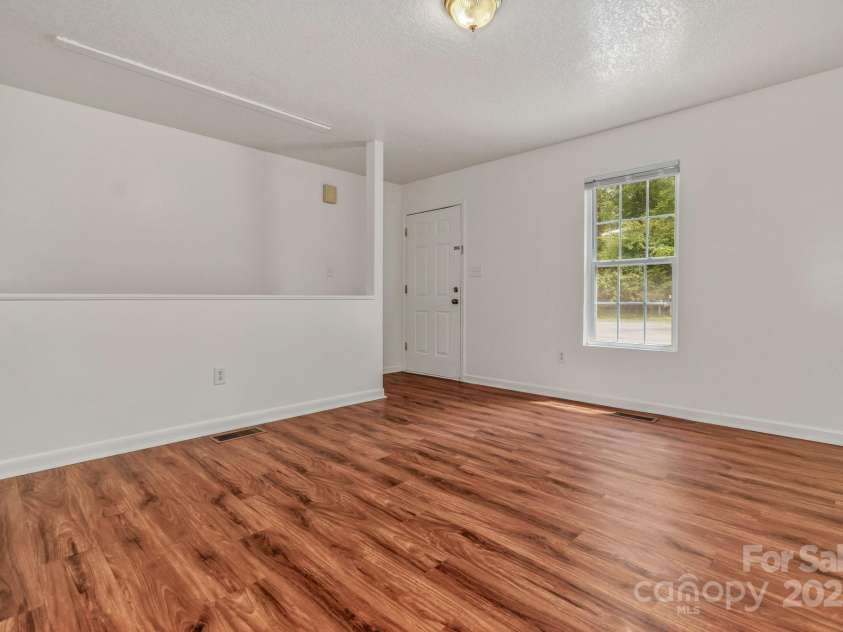 222 New Stock Road, Weaverville, NC 28787.  MLS# CAR4266697, YatesRealty ID 18833. Unit A Living room