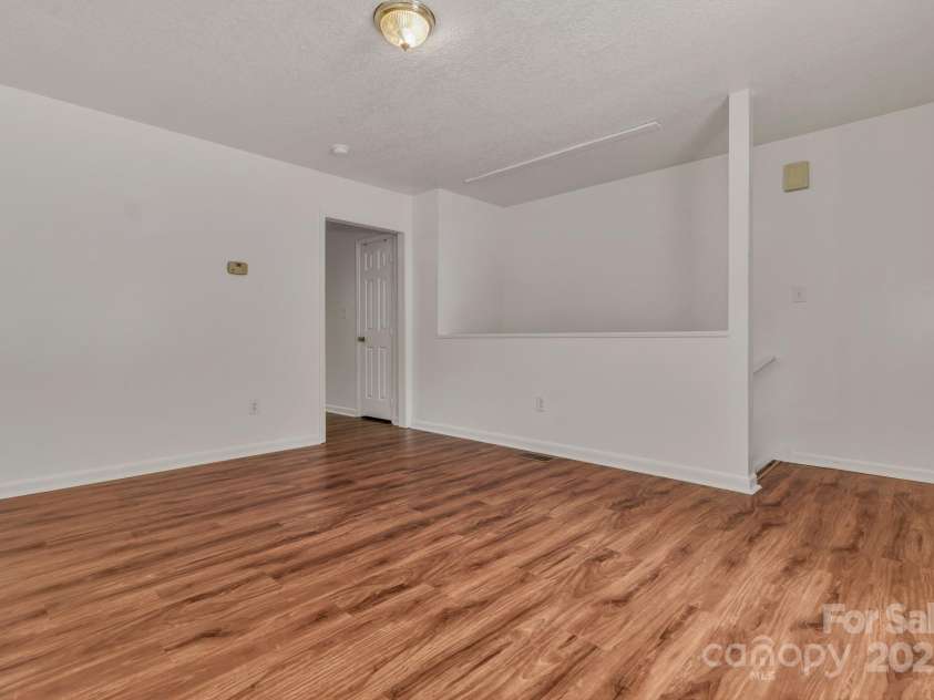 222 New Stock Road, Weaverville, NC 28787.  MLS# CAR4266697, YatesRealty ID 18833. Unit A Living room