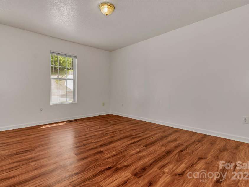 222 New Stock Road, Weaverville, NC 28787.  MLS# CAR4266697, YatesRealty ID 18833. Unit A Living room