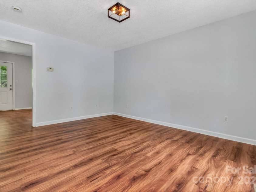 222 New Stock Road, Weaverville, NC 28787.  MLS# CAR4266697, YatesRealty ID 18833. Unit B - Living room