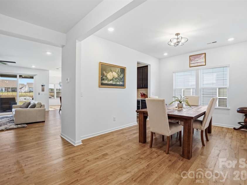 40184 Crooked Stick Drive, Lancaster, SC 29720.  MLS# CAR4356977, YatesRealty ID 18836. Dining Room with great rm to the back