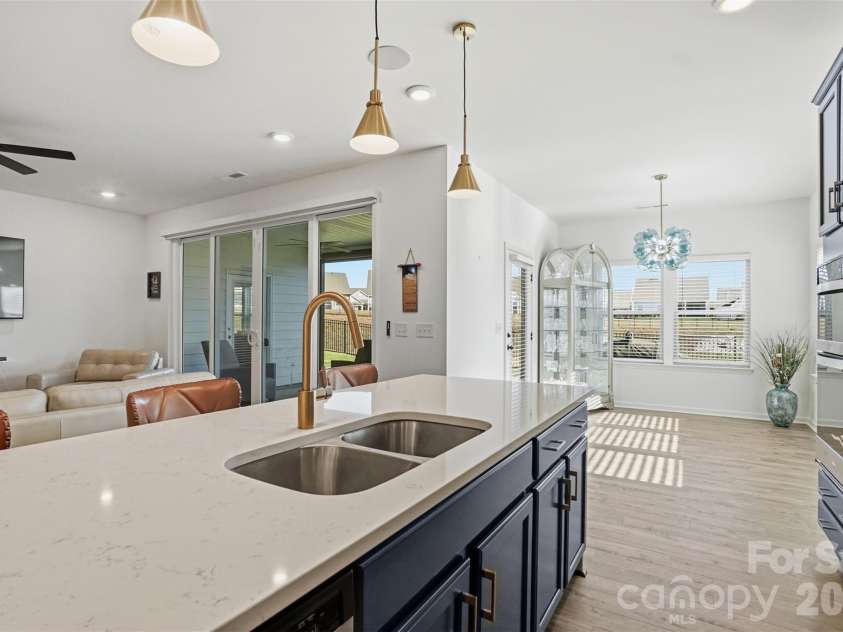 40184 Crooked Stick Drive, Lancaster, SC 29720.  MLS# CAR4356977, YatesRealty ID 18836. Kitchen with double sink, beautiful lighting