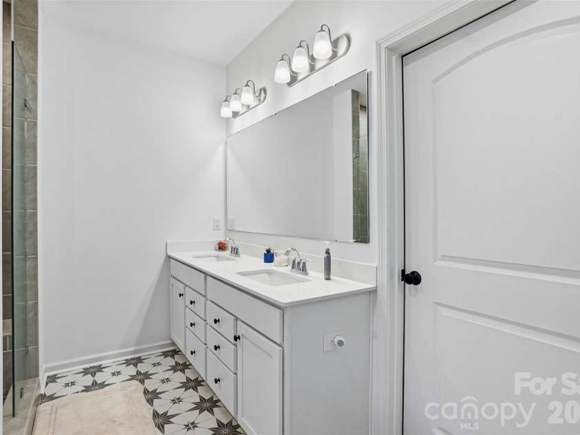 40184 Crooked Stick Drive, Lancaster, SC 29720.  MLS# CAR4356977, YatesRealty ID 18836. Primary bath with double sink vanity
